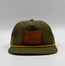 Load image into Gallery viewer, Olive green five-panel rope hat featuring a laser-cut and etched leather Oregon patch on a medium-profile snapback cap designed in Portland, Oregon