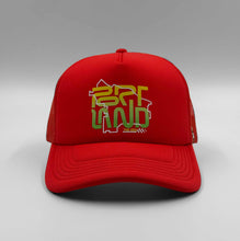 Load image into Gallery viewer, A red / orange trucker cap with a graphic text 'PORTLAND' on the front.
