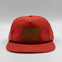 Load image into Gallery viewer, Orange five-panel rope hat featuring a laser-cut and etched leather Oregon patch on a medium-profile snapback cap designed in Portland, Oregon
